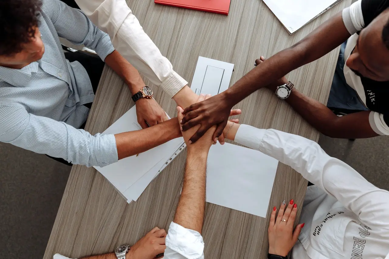 BEE Ownership Misconceptions - Business professionals concluding a BEE deal with a handshake